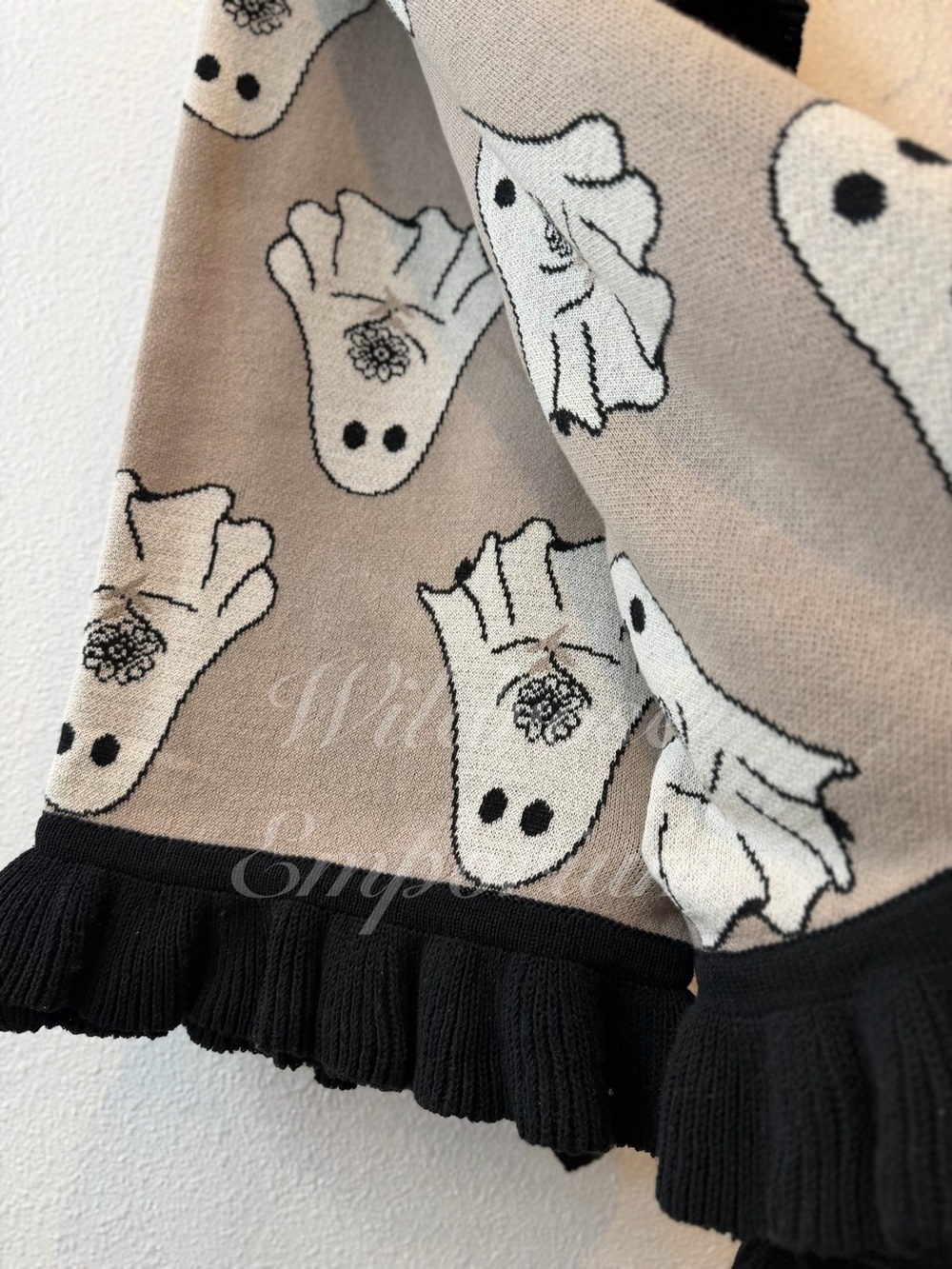 Cupcakes and Cashmere ghost holding bouquet flowers ruffled hem knit throw viral - Picture 6 of 9